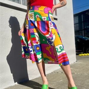 Nooworks slit skirt in the print “Bug Out” XS. 
Print on image 3